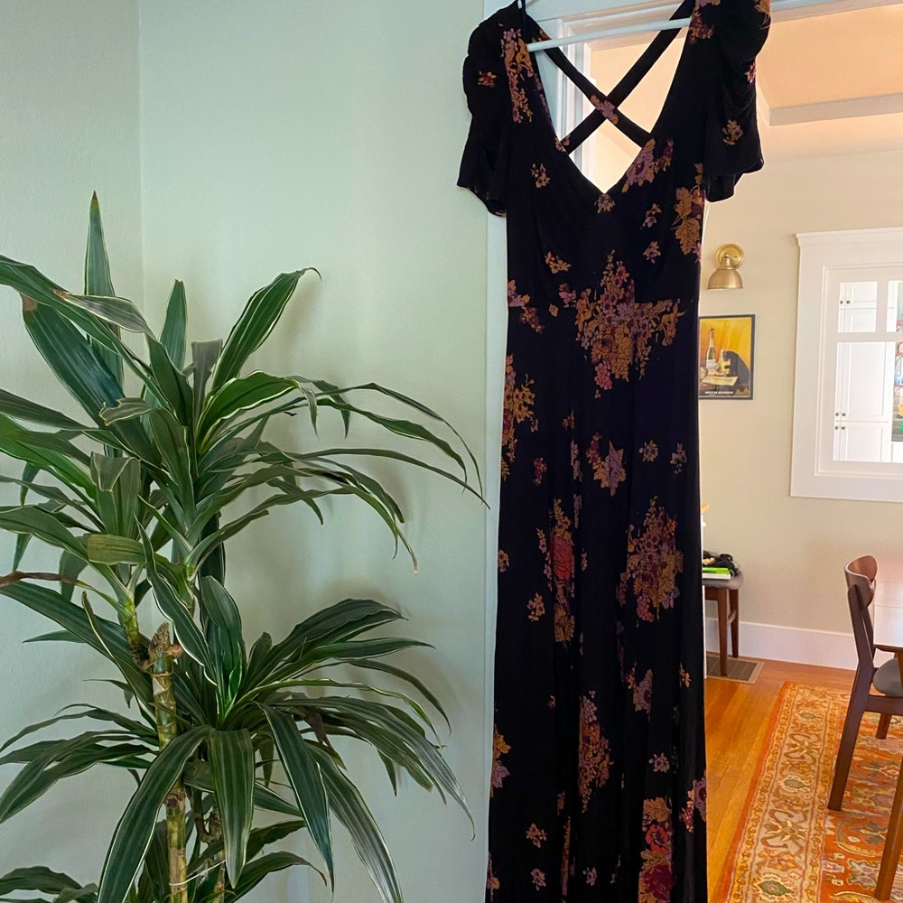Free People floral open back dress in size S. Black with orange/gold flowers